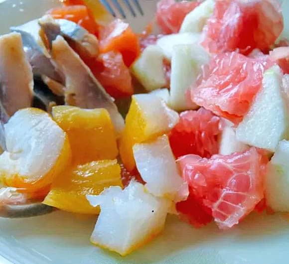 La recette Salade fraîcheur fruitée aux trois poissons